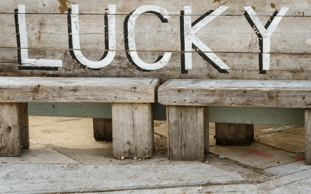 This is a beach side bench that readys lucky, as in the lucky in "Lucky Number Slevin".