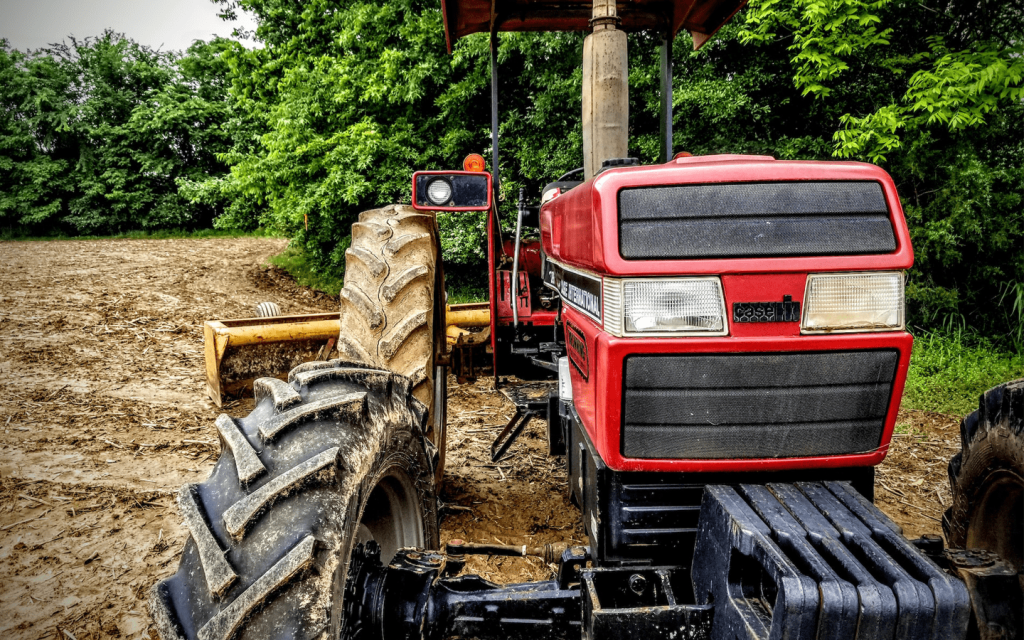 This is a red tractor that looks much like the tractor of the family in "Queen Sugar".