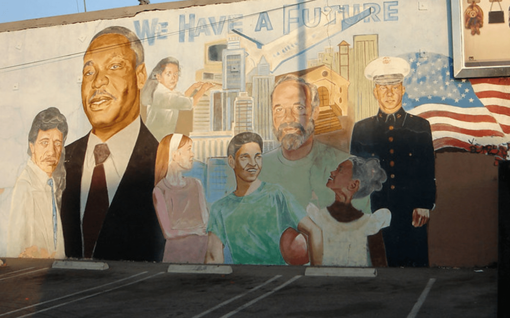 This is a political Mural in Boyle Heights of Martin Luther King amongst other important activists with the words "We Have A Future" on a wall. It is used to describe the culture of the community in "Vida"