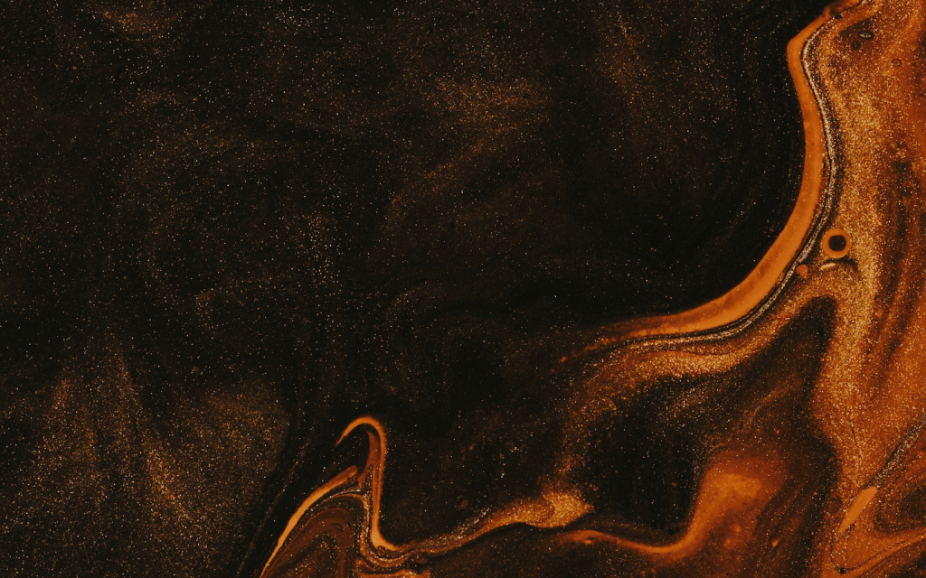 This is a painting with dark brown and orange swirls with sparlking yellow infusions which create an image of a firery path at the right side of the image. It almost makes it seems as though the painting was on fire at the corner while simultaenously seeming as though the light is engulfing the darkness. This image is used to describe the incendiary tone of Beyond The Dream and the surreal way in which delusion warps reality.